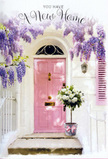 In this tranquil Kennington doorway scene, a soft pink front door stands at the centre like a warm invitation, bordered by generous cascades of wisteria that trail down in fragrant lavender clusters from above. The flowers hang loosely, their delicate petals catching the sunlight in a way that recalls the romantic spring façades around Kennington Park and the side streets leading towards Vauxhall. The walls around the door are gently whitewashed, with a faintly textured surface that holds the light and creates subtle shadows near the pastel shutter. On the step, slightly to one side, rests a stylish grey metal bucket filled to the brim with creamy white roses, each bloom open and lush, arranged so they seem to lean forward in a quiet greeting. Fresh green foliage peeks between the roses, bringing soft contrast and a sense of natural movement, while a pale pink ribbon tied around the bucket's base echoes the door's colour and adds a delicate, celebratory touch. The lighting is soft, suggesting a late afternoon or early evening moment when the street is calm and the day's bustle has eased, leaving only the gentle hum of the neighbourhood. Everything about the composition-the pastel tones, the tumbling wisteria, the generous bouquet-communicates a feeling of optimism and welcome, as though the flowers have been delivered to mark a housewarming or congratulate someone settling into a first home just off Kennington Road. It is a captured instant of peace and promise, with every petal and vine quietly blessing the threshold they adorn.